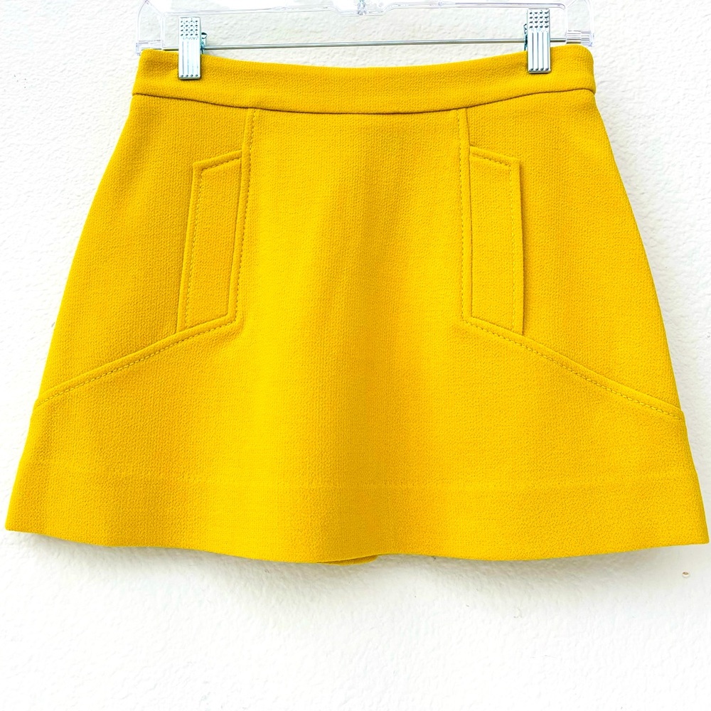 P.A.R.O.S.H.
matelassé mid-rise mini skirt in mustard yellow pocket details NWT